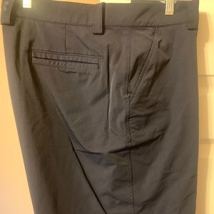 Black under armour dri fit golf shorts. 38